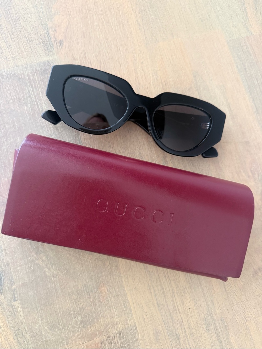Gucci Black Cat-Eye Sunglasses with Burgundy Case bold geometric cat-eye